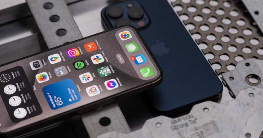 Photo of iPhone 15 Pro surrounded by metal.